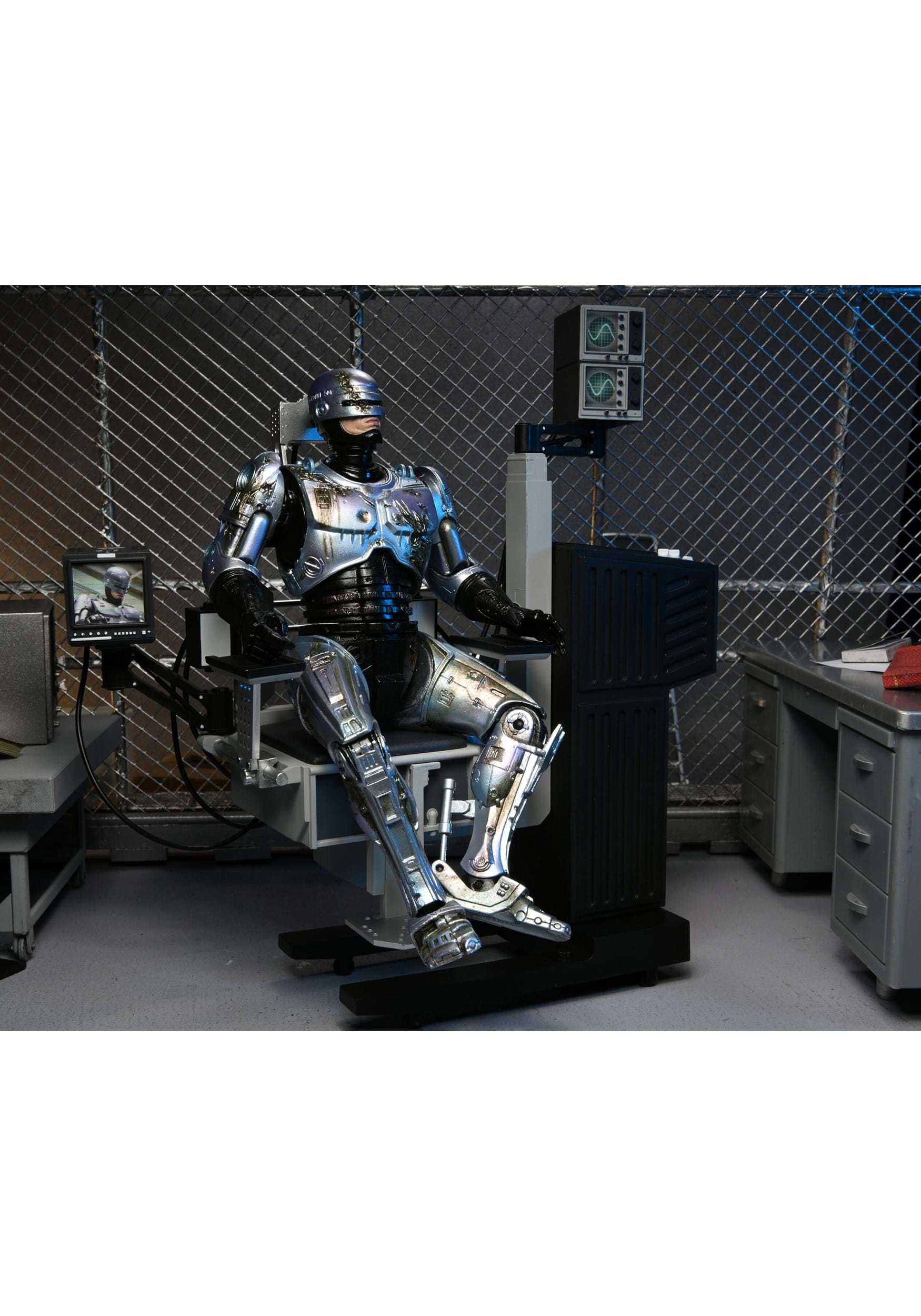 Ultimate Battle Damaged RoboCop with Chair 7" Scale Action Figure 2 Ultimate Battle Damaged RoboCop with Chair 7" Scale Action Figure