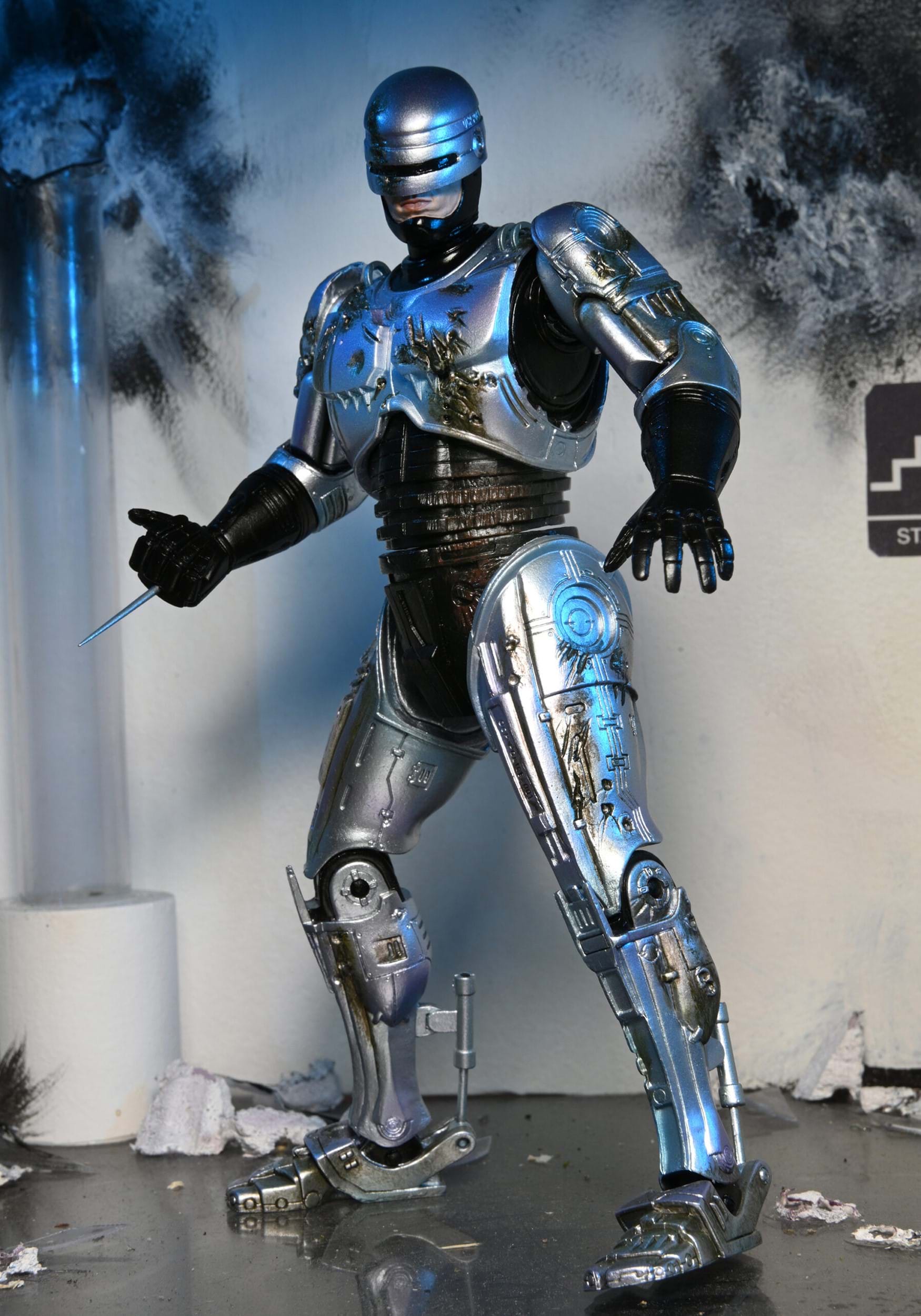 Ultimate Battle Damaged RoboCop with Chair 7" Scale Action Figure 7 Ultimate Battle Damaged RoboCop with Chair 7" Scale Action Figure
