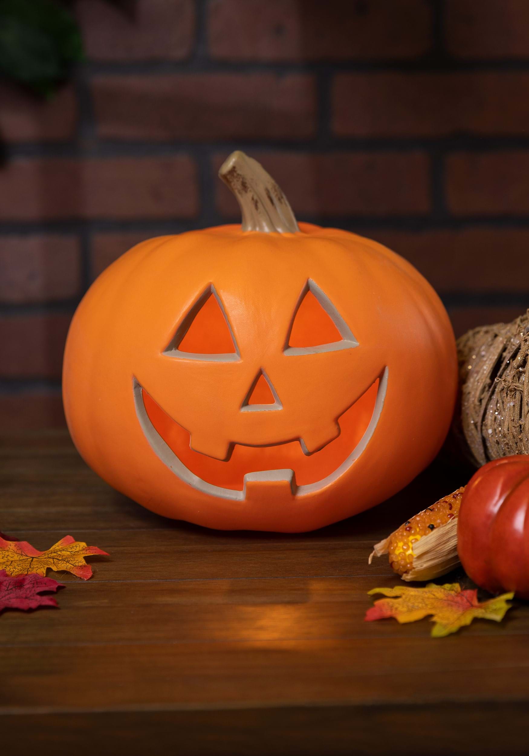 8-Inch Traditional Light Up Pumpkin Halloween Prop 2 8-Inch Traditional Light Up Pumpkin Halloween Prop